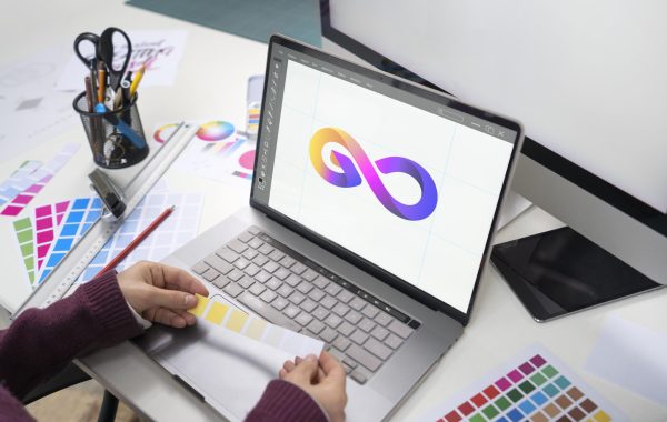 young-female-designer-working-her-laptop